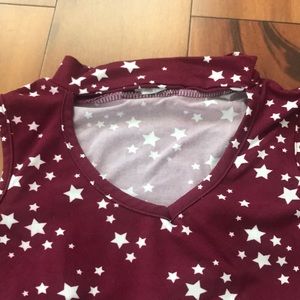 Maroon stars shirt over the shoulder V-neck